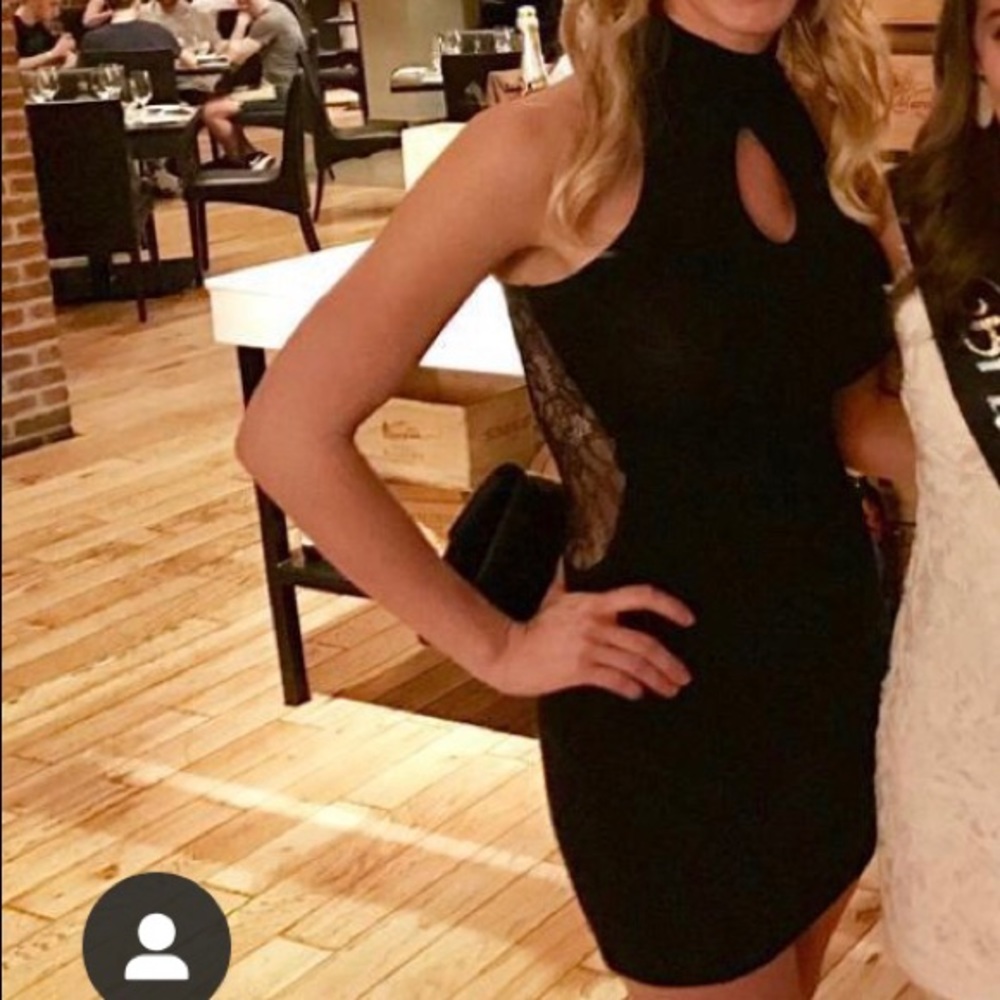 Slimming black Bebe dress. Entire back is lace